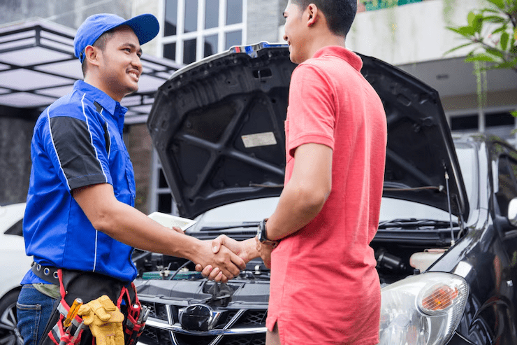 Technician shake hand with customer